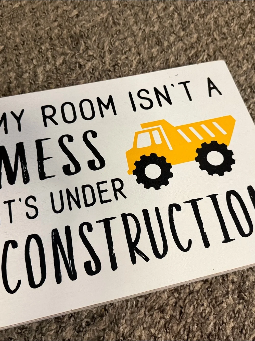 Hobby Lobby White Wall Sign with Yellow Construction Truck and Black Lettering